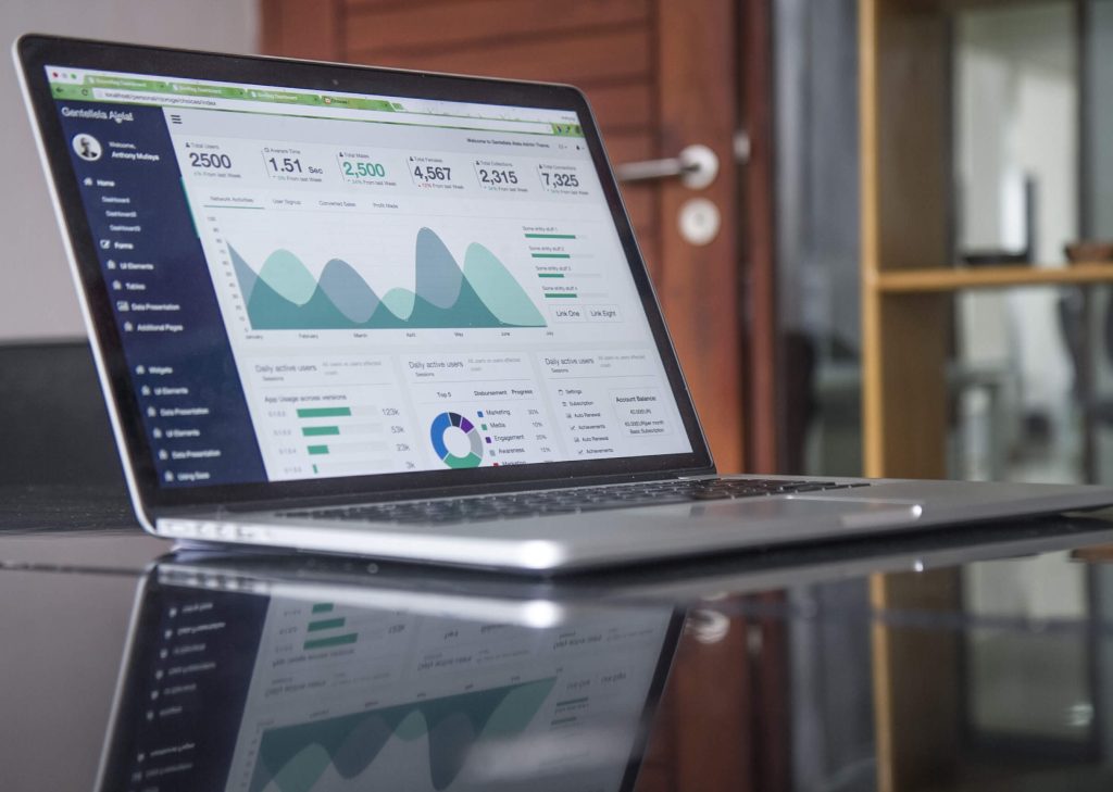 Laptop showing a website analytics dashboard